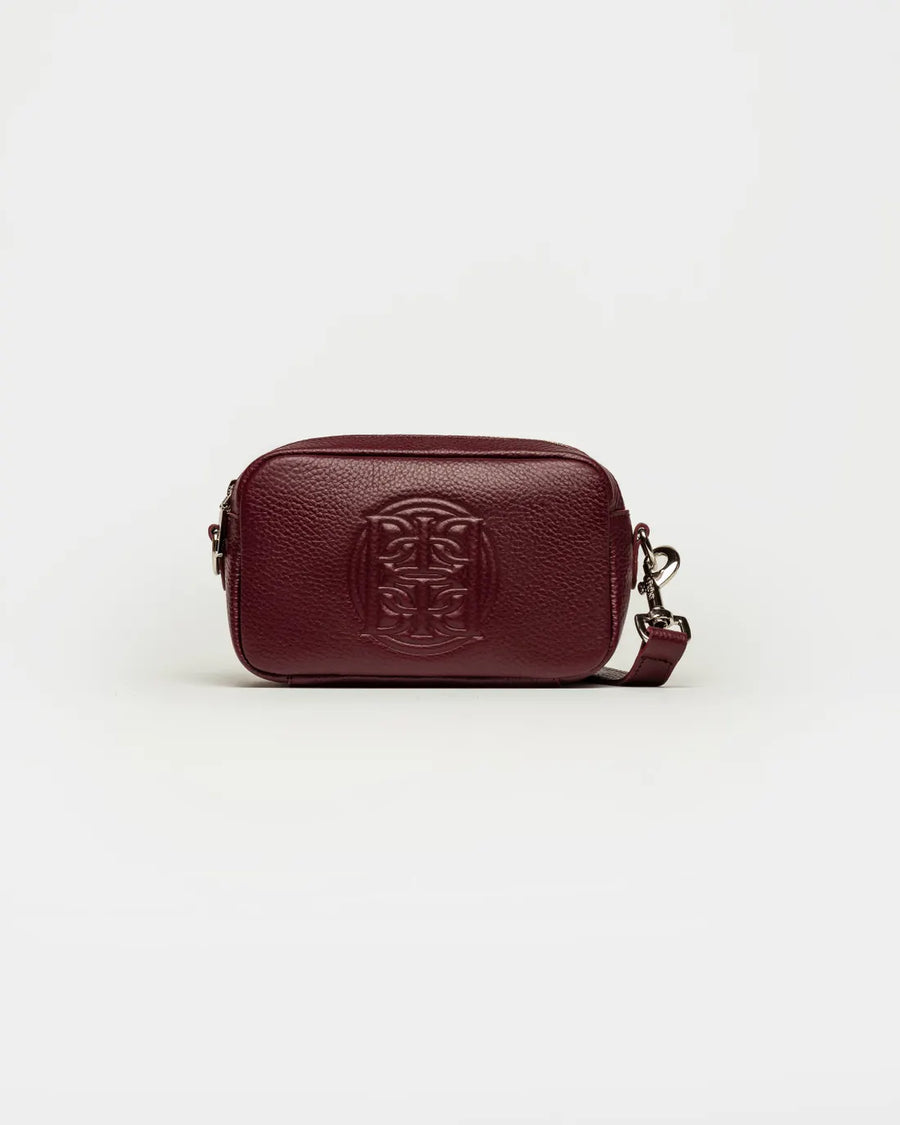 Bandolera New Eterial en cuero graneado burgundy